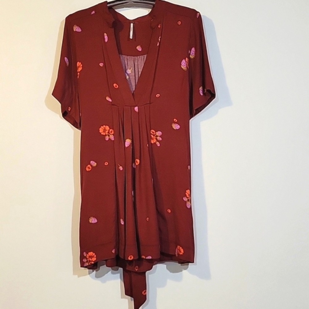 Free People dress with pockets size medium Burgundy color with waist ties